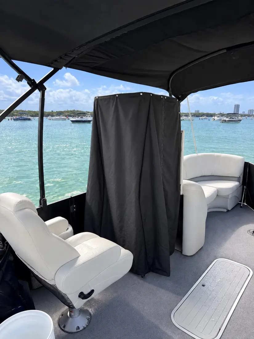 Onboard changing station with privacy curtain